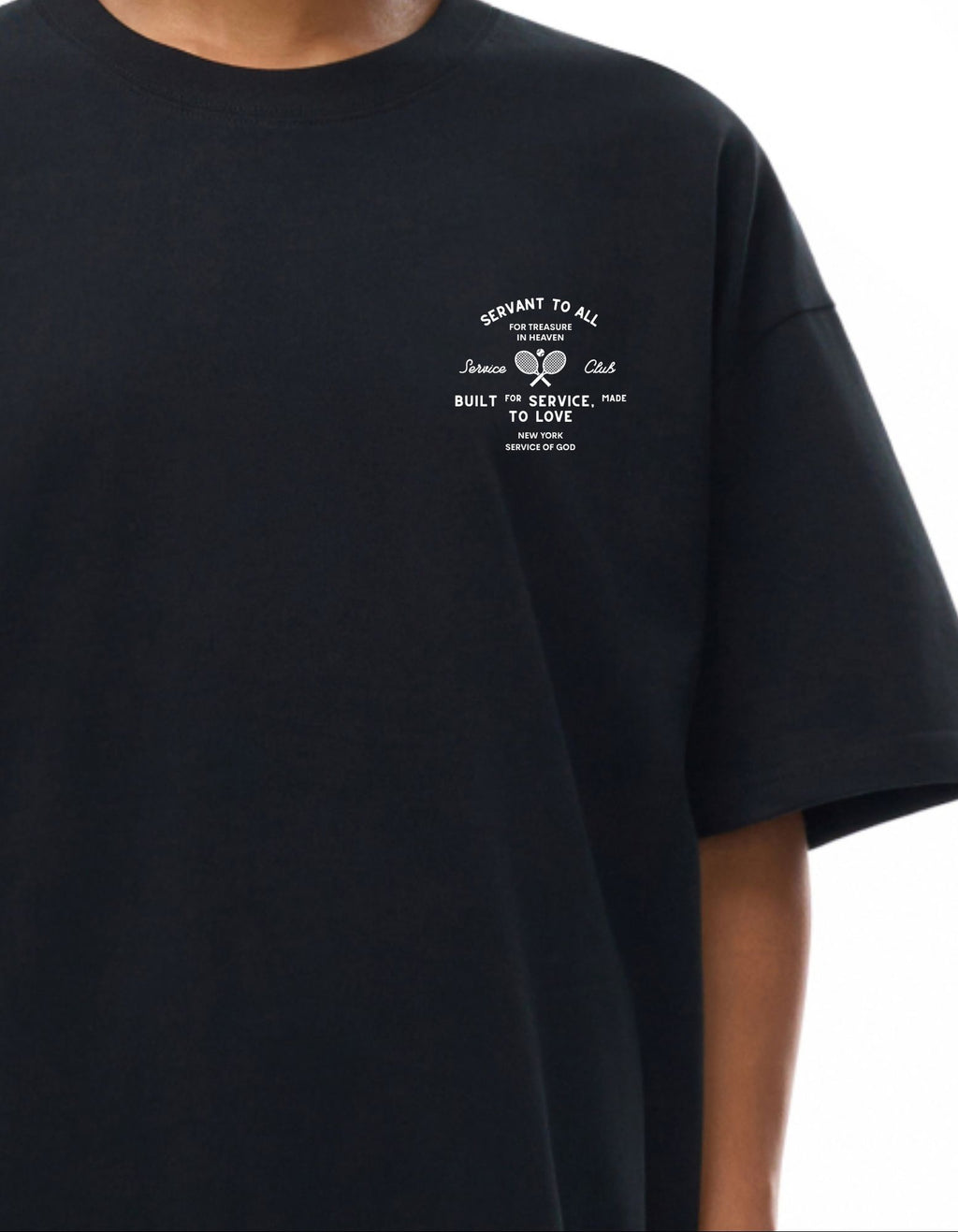 Black t-shirt with a white graphic and text saying, "servant to all for treasure in heaven," on a white background 
