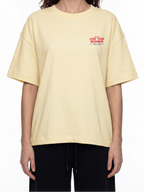 LOVE YOUR NEIGHBOR TEE BUTTER YELLOW