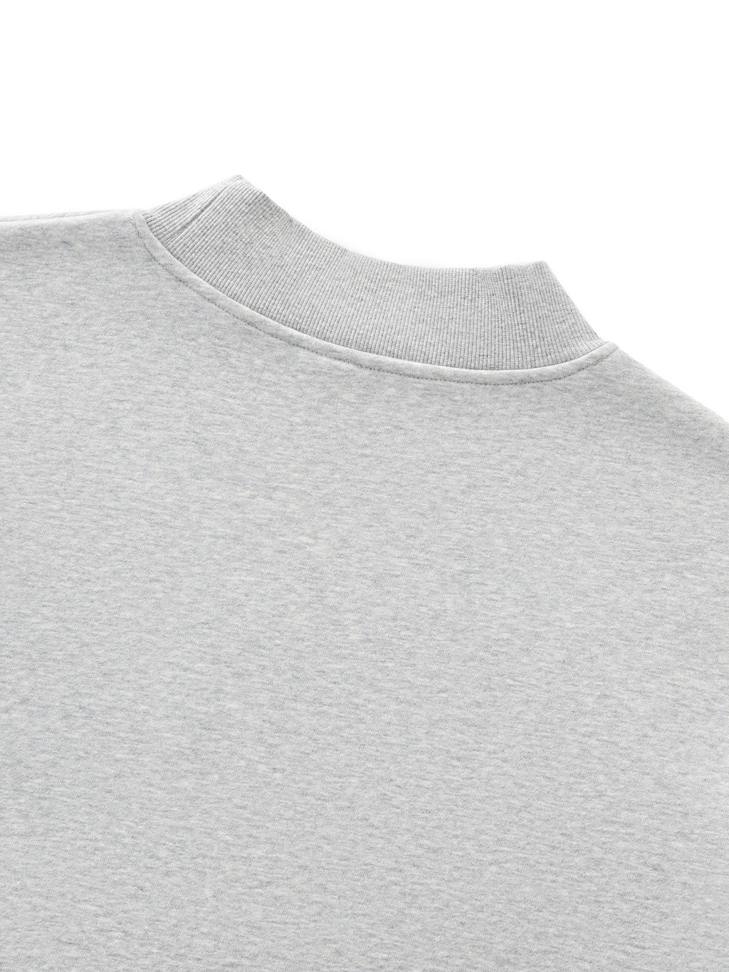 Close-up of a gray sweatshirt collar on a white background. grey christian crewneck.