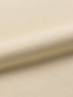 apricot crewneck fabric details. 100% cotton.